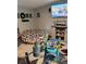 Cozy living room with comfortable seating, a TV, and decorative touches creating a welcoming atmosphere at 6915 Dove Meadow Trl, Lakeland, FL 33810