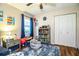 Bedroom with space themed decor, plush rug, natural light, and built-in storage at 6920 Newman E Cir, Lakeland, FL 33811