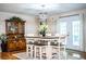 Dining room with hardwood floors and open sightlines to breakfast nook at 6920 Newman E Cir, Lakeland, FL 33811