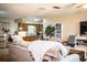 A combined dining and living room area provides seamless space for entertainment and dining at 6920 Newman E Cir, Lakeland, FL 33811