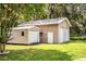 Backyard storage building providing ample space for equipment and outdoor essentials at 6920 Newman E Cir, Lakeland, FL 33811