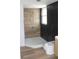 Modern bathroom with a walk-in shower and a sleek design at 701 1St Ne St, Fort Meade, FL 33841