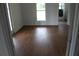 Bright bedroom featuring modern hardwood floors, and natural light at 701 1St Ne St, Fort Meade, FL 33841
