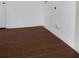 Bright laundry room featuring wood-look floors at 701 1St Ne St, Fort Meade, FL 33841