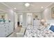Relaxing main bedroom with ensuite bath and and dressers at 7770 Lake James Blvd, Lakeland, FL 33810