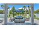 Enjoy this cozy back patio with a seating area perfect for entertaining and relaxing at 8120 Soldierwood St, Winter Garden, FL 34787