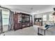 Spacious bonus room with carpeted floors, a TV, and large windows at 8120 Soldierwood St, Winter Garden, FL 34787