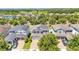 Two story home with three car garage, manicured landscaping and paved driveway at 8120 Soldierwood St, Winter Garden, FL 34787