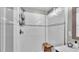 This tiled shower with glass door features a built in bench, and tiled walls at 8120 Soldierwood St, Winter Garden, FL 34787