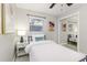 Bright bedroom featuring a single bed, mirrored closet, and modern decor at 906 E Lowell St, Lakeland, FL 33805