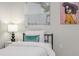 Cozy bedroom featuring a single bed, modern decor, and a window with blinds at 906 E Lowell St, Lakeland, FL 33805
