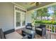 Relaxing covered porch with comfortable seating, perfect for enjoying the outdoors and a lovely view at 1018 E Highland Dr, Lakeland, FL 33813