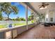 Spacious, screened-in patio featuring brick floors and a view of the yard at 1018 E Highland Dr, Lakeland, FL 33813