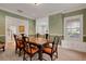 Dining room with a large table, seating for six, and a built-in window bench at 1018 E Highland Dr, Lakeland, FL 33813