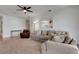 Comfortable living room with kitchen views and plush seating, great for gatherings at 1018 E Highland Dr, Lakeland, FL 33813