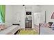 Bright, playful bedroom featuring twin beds, wood floors, and fun decor at 1044 Timbers Dr, Fort Meade, FL 33841