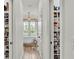 Spacious closet with built-in shelving leading to the main bathroom at 1044 Timbers Dr, Fort Meade, FL 33841