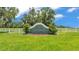 Entrance to the Timbers North community with lush greenery and decorative landscaping at 1044 Timbers Dr, Fort Meade, FL 33841