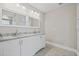 Bright bathroom featuring double vanity with granite countertops at 1102 Berkley Ln, Winter Haven, FL 33880