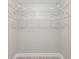 Walk-in closet with shelving at 1102 Berkley Ln, Winter Haven, FL 33880