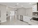 Open floor plan with a combined kitchen and living space with modern appliances and a fireplace at 1102 Berkley Ln, Winter Haven, FL 33880