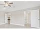 Spacious main bedroom featuring tile floors and easy access to bathroom at 1102 Berkley Ln, Winter Haven, FL 33880