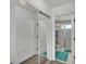 This full bathroom features a stand up shower, white tiling and is brightly lit at 141 Minniehaha Cir, Haines City, FL 33844