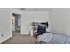 This bedroom features neutral carpet, light walls, and closet at 141 Minniehaha Cir, Haines City, FL 33844