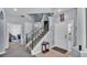 Spacious foyer featuring a staircase and tile flooring at 141 Minniehaha Cir, Haines City, FL 33844