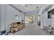 Living area with sliding glass doors to the pool and access to dining room at 141 Minniehaha Cir, Haines City, FL 33844