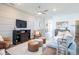 Spacious living room featuring modern furniture, a decorative wall, and an open layout with plenty of natural light at 1449 Fleur Dr, Davenport, FL 33837
