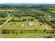 Wide aerial view shows property lines and outlines surrounding expansive acreage at 15195 Angus Rd, Polk City, FL 33868