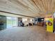 This bonus room features carpet, a wooden ceiling, and an arcade game at 15195 Angus Rd, Polk City, FL 33868