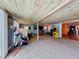 This bonus room has a wooden ceiling, arcade games, and carpeted floor at 15195 Angus Rd, Polk City, FL 33868