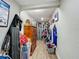 Hallway with furnishings leading to storage and more at 15195 Angus Rd, Polk City, FL 33868
