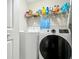 Laundry room features modern washer and dryer units at 15195 Angus Rd, Polk City, FL 33868