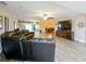 Open concept living room featuring wood-look floors, recessed lighting, ceiling fans and neutral paint at 15195 Angus Rd, Polk City, FL 33868