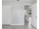 Open doorway to bedroom with wood-look flooring and closet space at 169 Birmingham Dr, Kissimmee, FL 34758