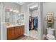Bathroom featuring vanity, toilet and walk in closet at 180 Azure Mist Way, Daytona Beach, FL 32124