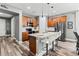 Kitchen featuring updated appliances, a central island, and ample cabinet space at 180 Azure Mist Way, Daytona Beach, FL 32124