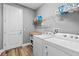 Laundry room with washer, dryer, and shelves at 180 Azure Mist Way, Daytona Beach, FL 32124