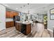 Bright, open-concept living space with island seating in the kitchen area at 180 Azure Mist Way, Daytona Beach, FL 32124