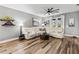 Comfortable living room features a plush white sofa and modern decor at 180 Azure Mist Way, Daytona Beach, FL 32124