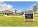 Community Magenta Park featuring a modern playground for with green lawn all around at 180 Azure Mist Way, Daytona Beach, FL 32124