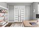 Office features updated fixtures and a decorative shelving unit at 180 Azure Mist Way, Daytona Beach, FL 32124