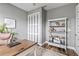 Well-appointed office with closet, decorative shelving, and modern design elements at 180 Azure Mist Way, Daytona Beach, FL 32124