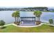Community pavilion with seating overlooking a beautiful lake at 180 Azure Mist Way, Daytona Beach, FL 32124