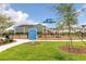 Community playground offers a safe and fun recreational area for children, fenced in with play rules sign at 180 Azure Mist Way, Daytona Beach, FL 32124
