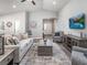 Inviting living area featuring stylish décor, hardwood flooring, and a cozy atmosphere at 1846 Daystar Dr, Haines City, FL 33844