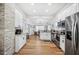 Modern kitchen featuring stainless steel appliances, granite countertops, and ample cabinet space at 213 Cannon St, Lakeland, FL 33803